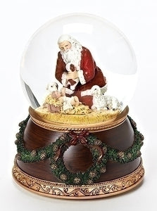 Kneeling Santa with Baby Jesus Music Snow Globe